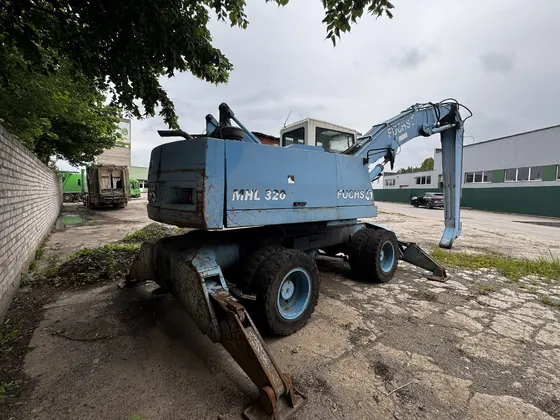 FUCHS MHL 320 galinis rakursas ir važiuoklė