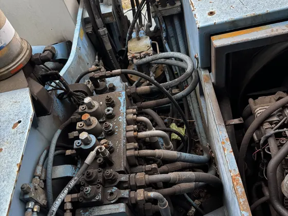 FUCHS MHL 320 hidraulikos mazgas ir žarnos